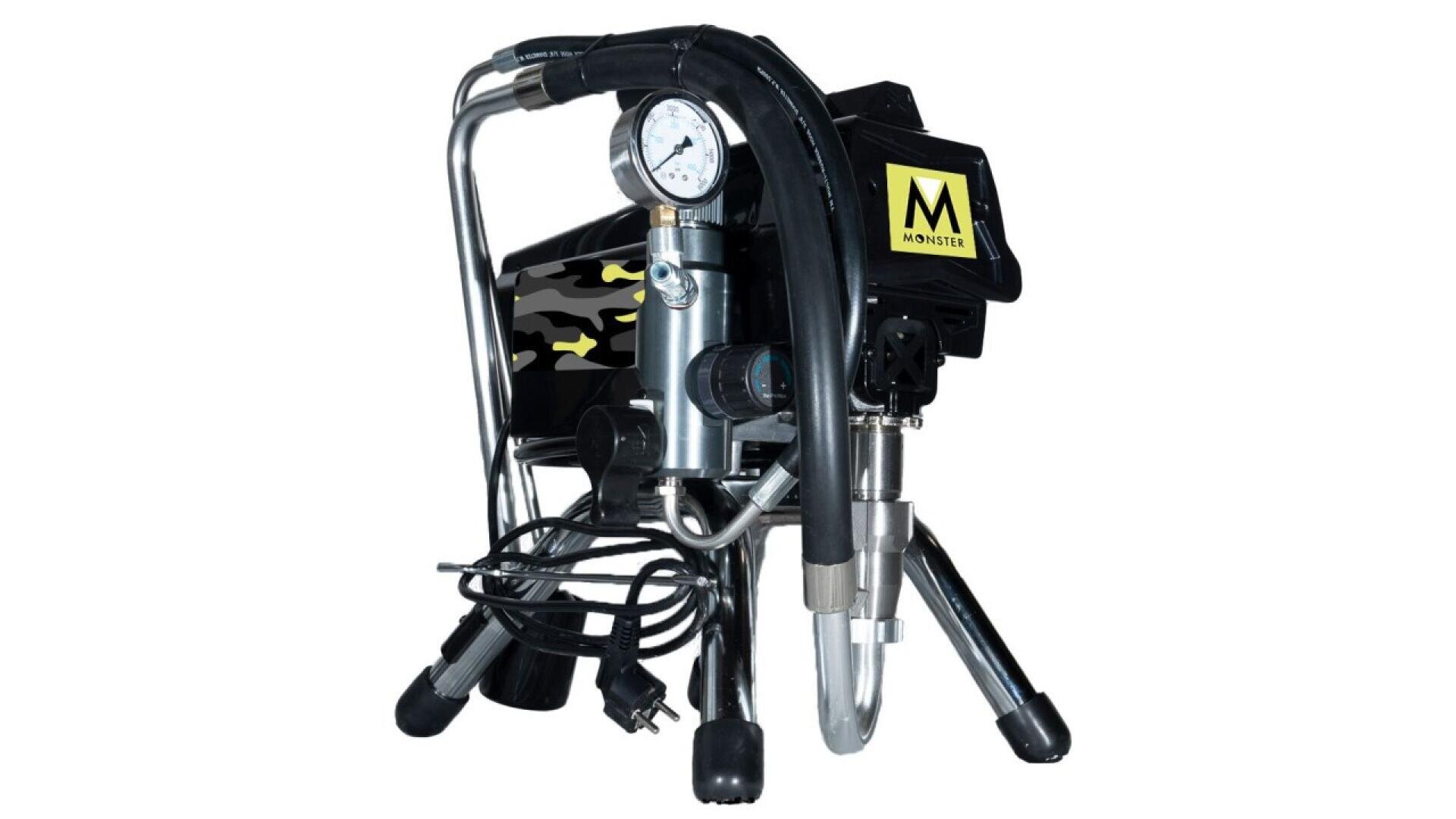 A black electric airless paint sprayer with a pressure gauge, power cord, hose, and a Monster logo on the side, standing on metal legs against a white background.
