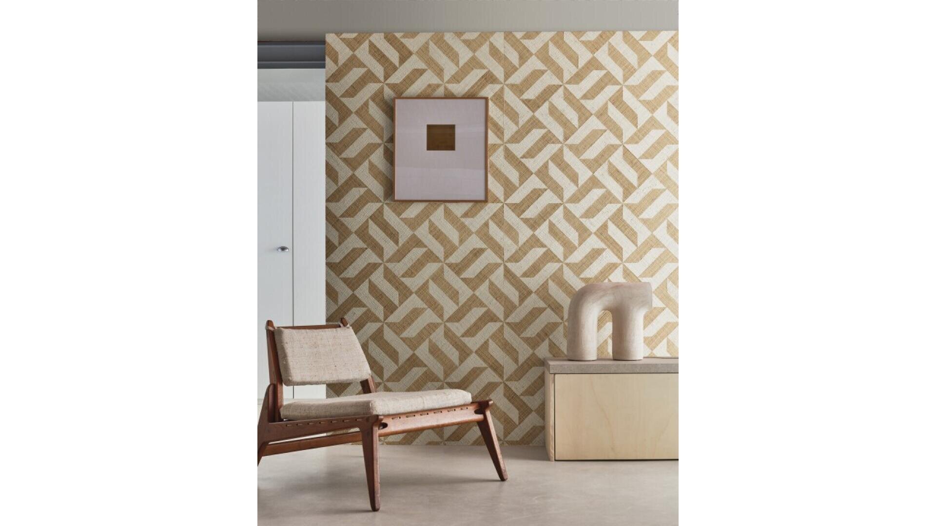 A modern interior with a geometric patterned beige and white accent wall, a mid-century wooden chair with light upholstery, a minimalist wooden bench, a ceramic sculpture, and a framed abstract artwork.